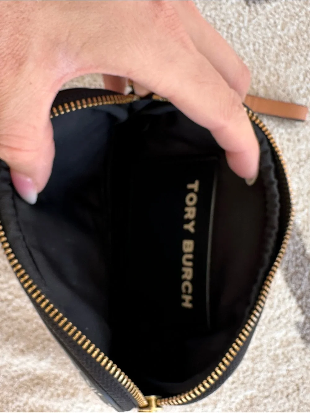 Tory Burch Black and Tan Patterned Logo Wristlet with Stripe Detail